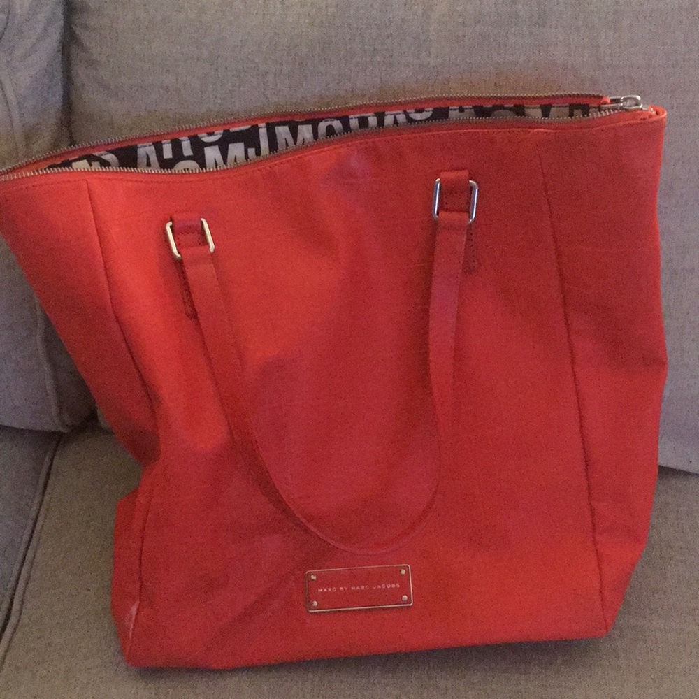 Textured Orange- red Marc Jacob’s bag